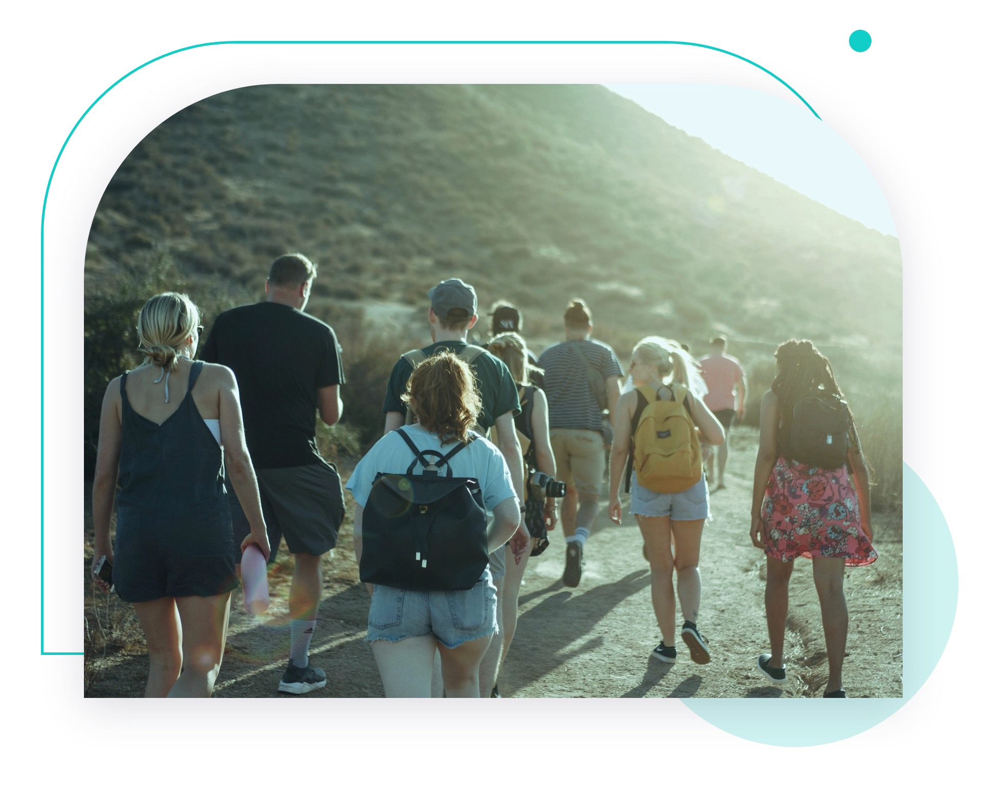 A group walking a coastal trail together
